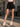Women Black Solid Relaxed Fit Short
