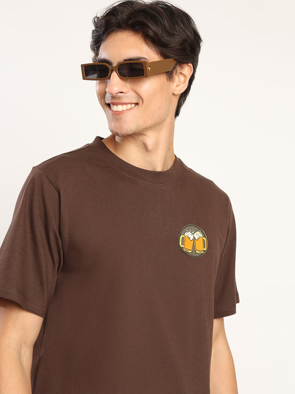 Men Brown coloured regular fit T Shirt with embroidery badge