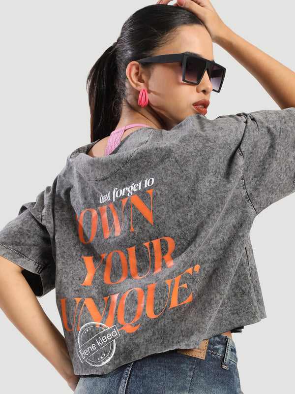 Women Oversized Fit T-Shirt With Graphics And Raw Edges
