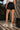 Women Black Solid Relaxed Fit Short